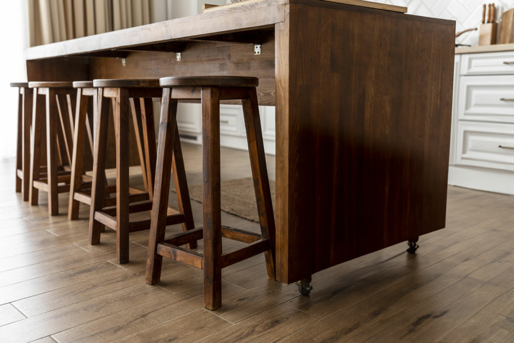 Wooden furniture featuring a dark brown wood stain.